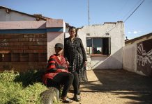 Jeanny Mbalati and her daughter Dinah outside their home in Soweto. It took them more than a year to get a loved one into a psychiatric hospital following his removal from Life Esidimeni facilities.