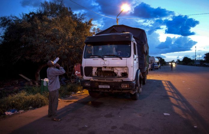 Tens of thousands of men crisscross Zimbabwe as long-haul truck drivers and the risks they face aren't just on the road.