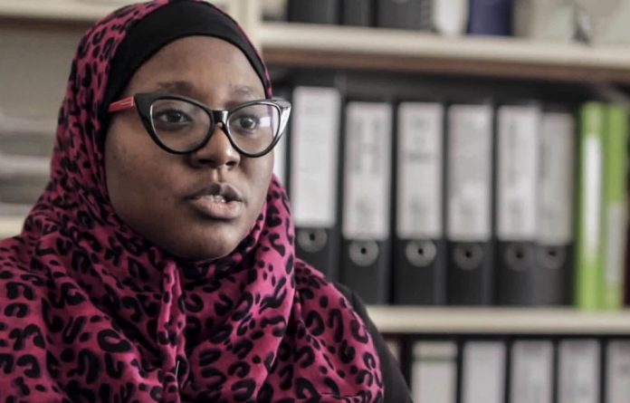 Helping hand: Hauwa Ojeifo owns an organisation that helps to support women facing mental health issues.