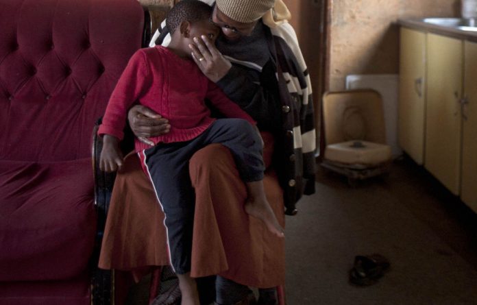 The mother of four-year-old Themba died weeks after his birth. He is being raised by his grandmother Sophie