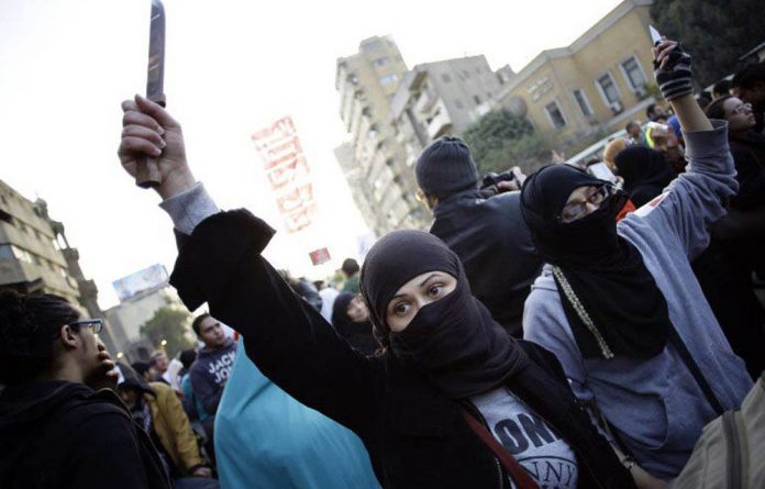 Women protest in Cairo in 2014. When activists have uteruses