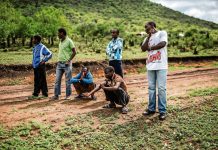 Young men from a rural area of KwaZulu-Natal wait to be picked up by health workers working with Doctors Without Borders to undergo medical circumcision.