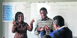 Bridging the gap: Pupils at the Emerald Hill School for the Deaf learning sign language. The majority of deaf people in Zimbabwe reportedly cannot read or write.