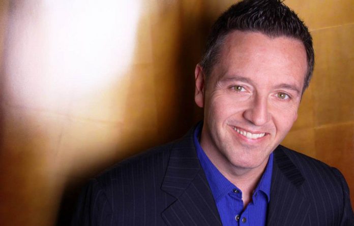 John Edward says he was once a sceptic too.