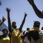 Elated: ANC supporters welcome the news that higher education will be free for some but it may eat into the health budget.