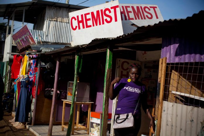 Editar Ochieng leaves a chemist in Kibera having purchased termination pills. (Kate Holt, The Guardian)