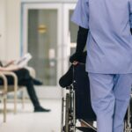 Nurse Pushing Wheelchair